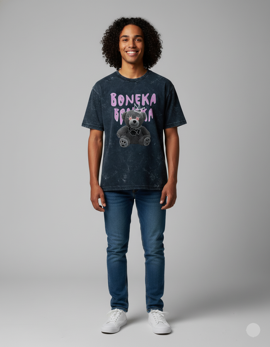 Person wearing a t-shirt with 'Boneka' design on a gray background
